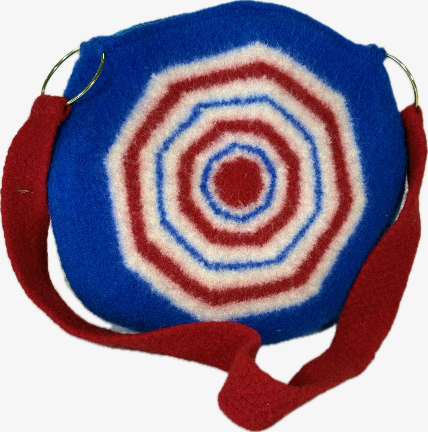 Round bag with blue, red, and white concentric circles